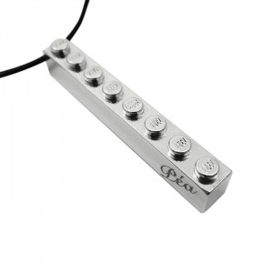 Silver 999° lego-themed pendant